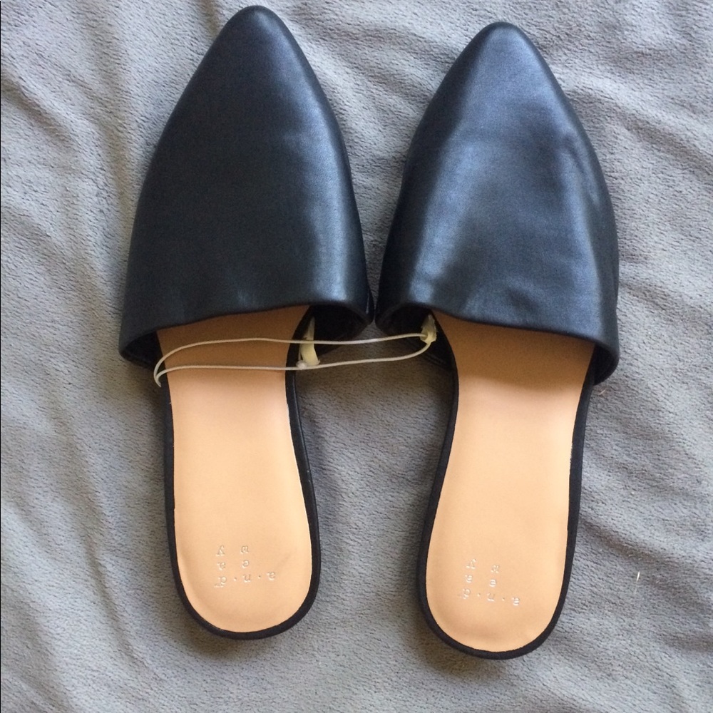 A New Day black mules. Size 7.